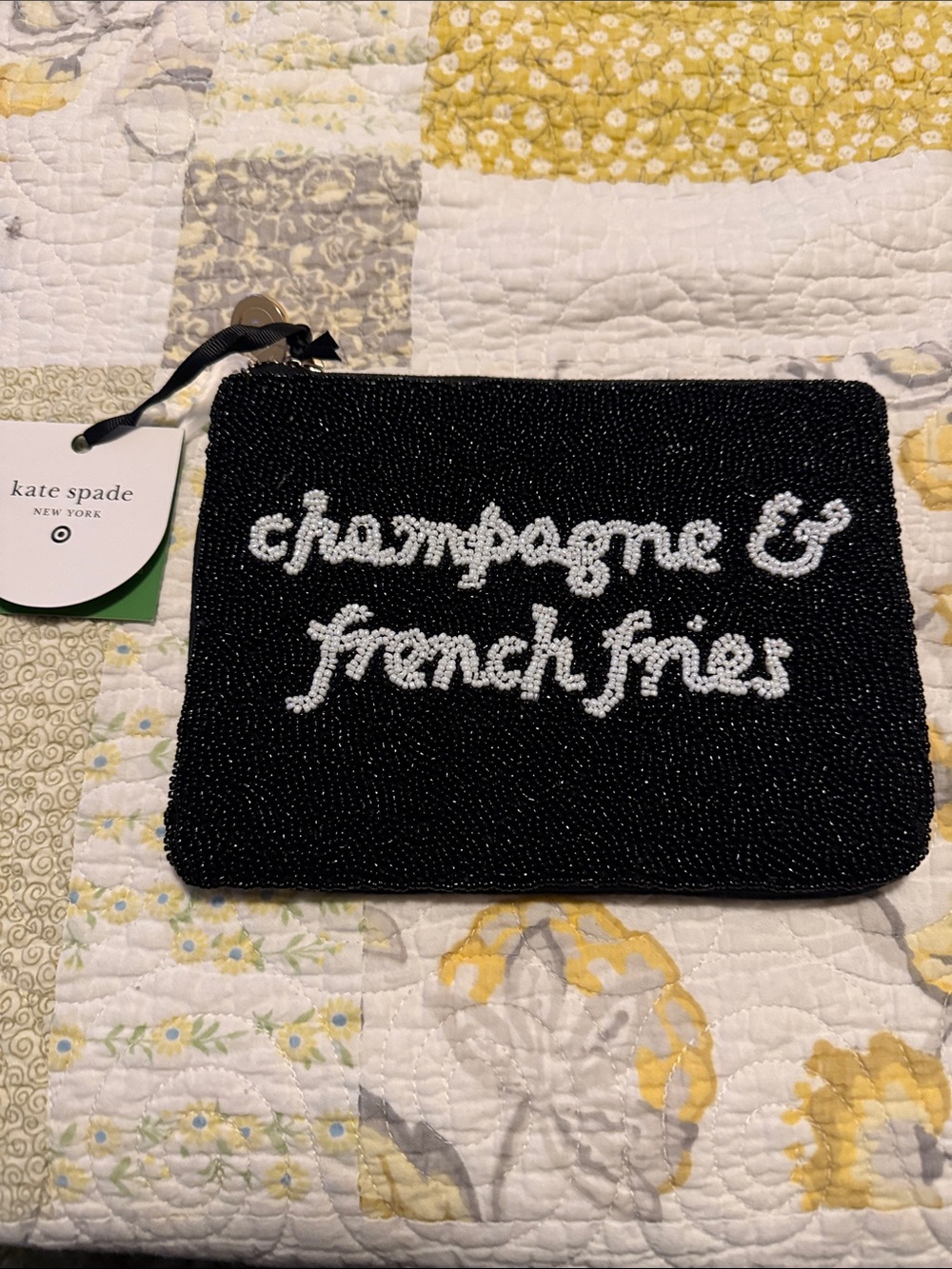 kate spade black beaded pouch with white script